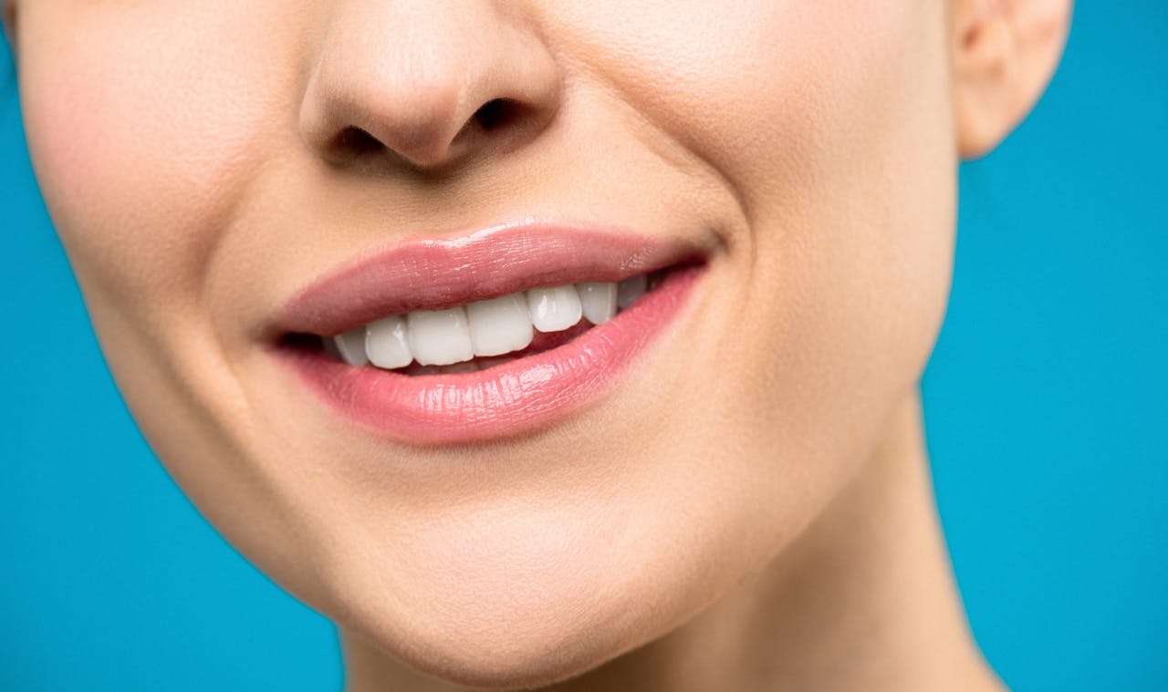 A woman's mouth close up and smiling